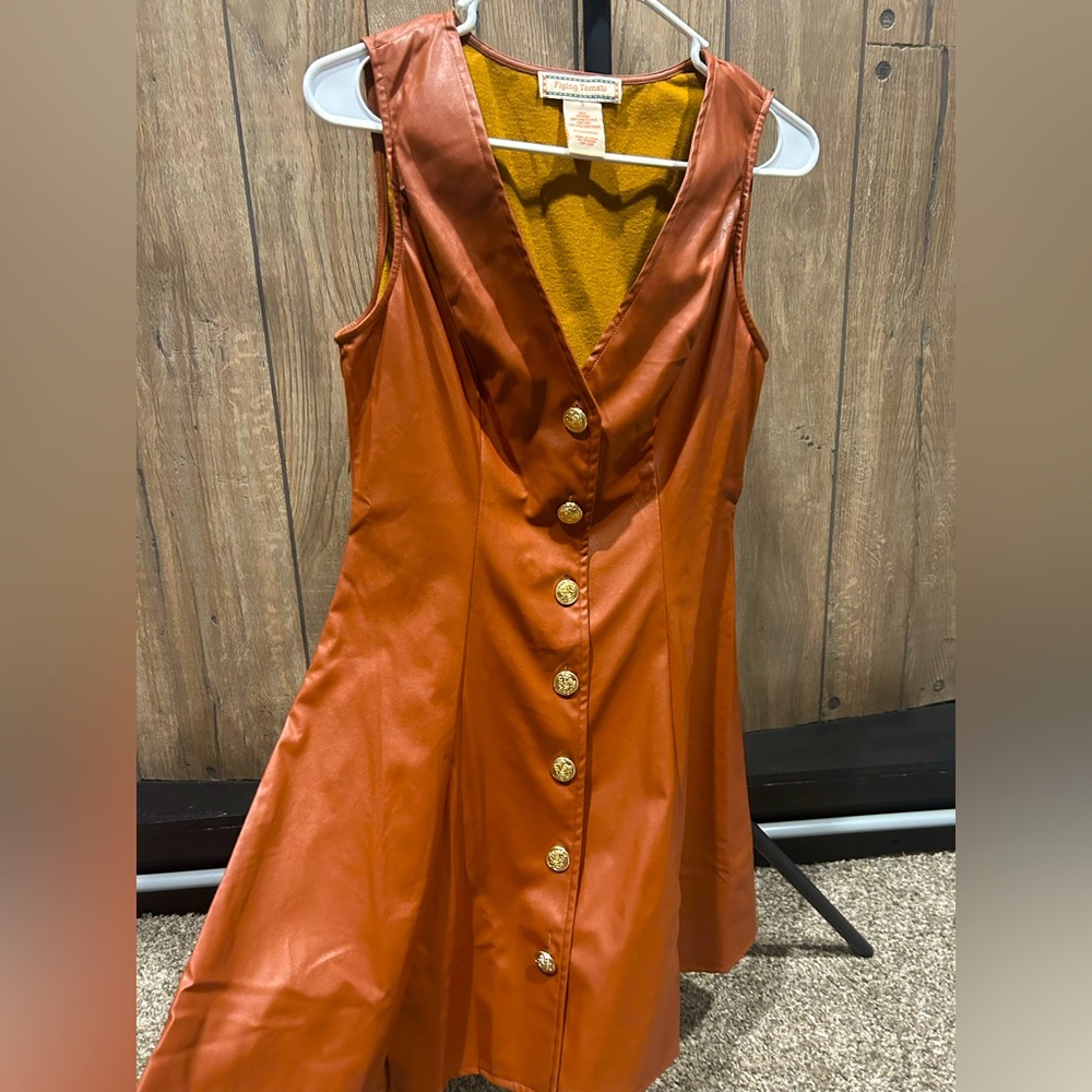 New leather brown vest.